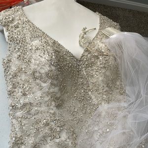 Allure Bridals Couture bedazzled dress. Long detailed trail.